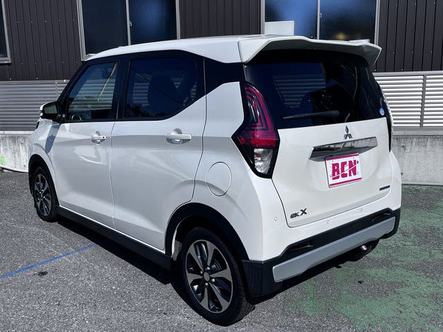 ek X