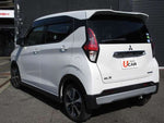 ek X