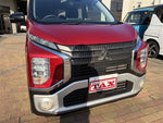 ek X