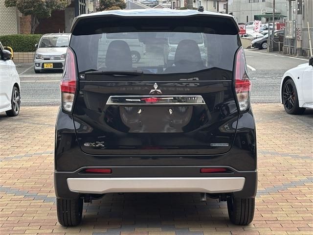 ek X